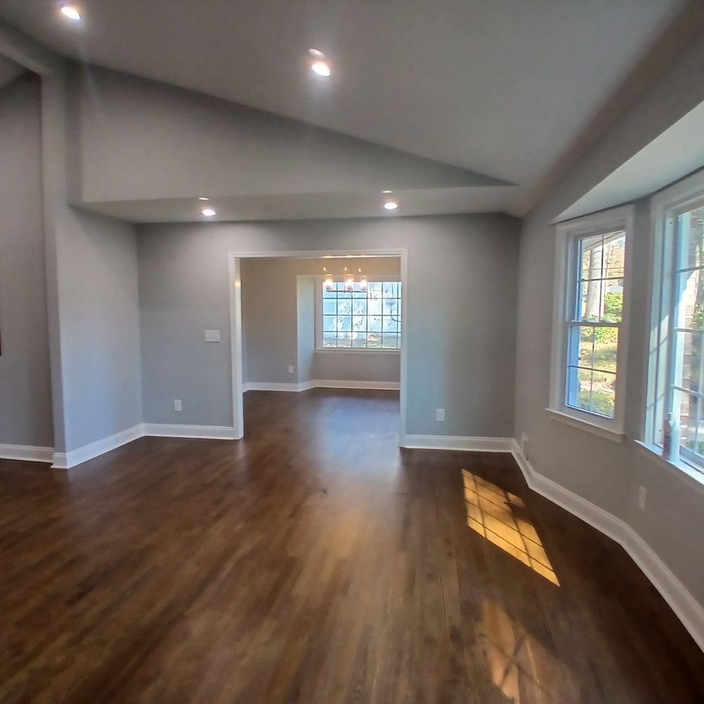 Open plan living area with hardwood floors